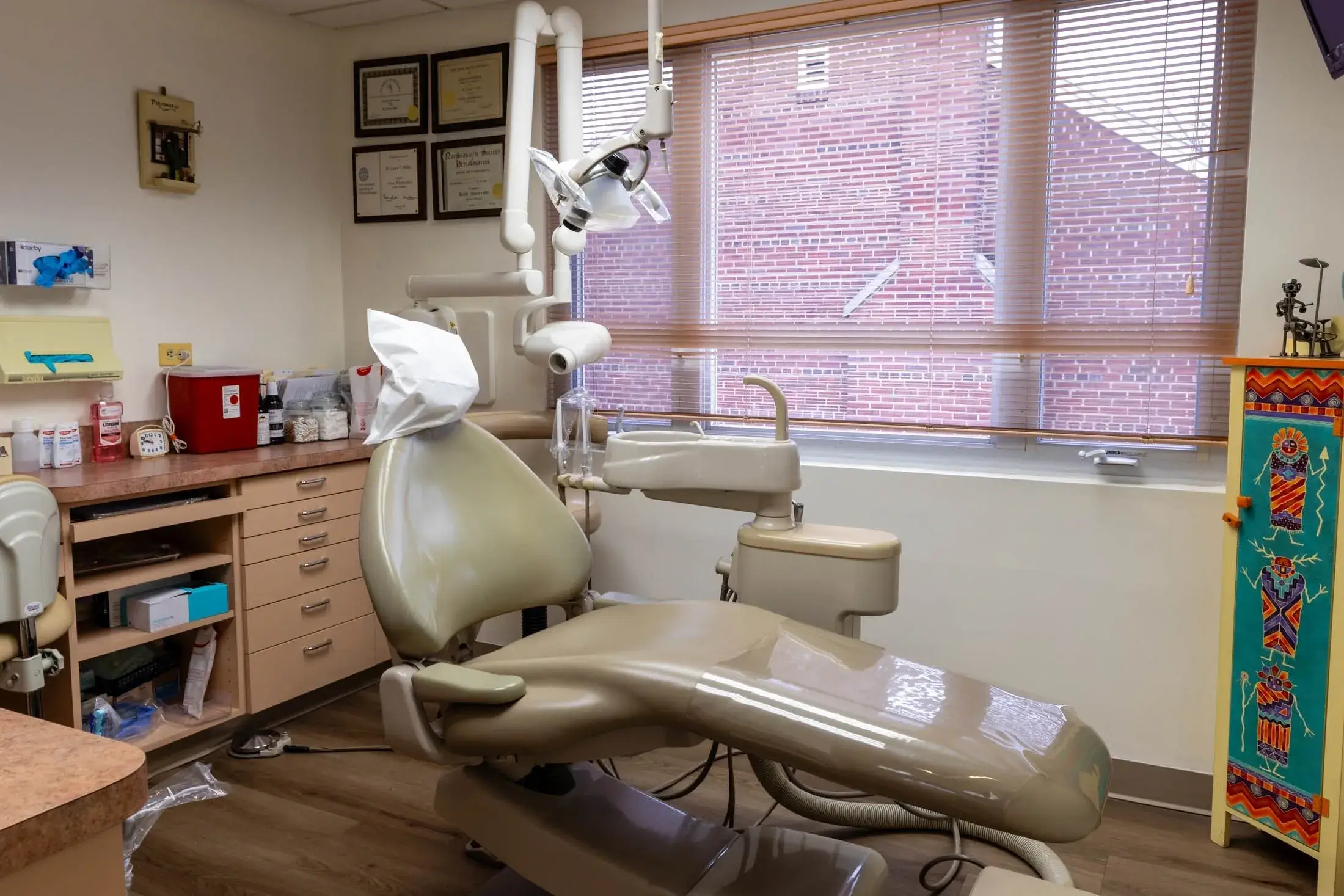 Dental office with examination chair and equipment.